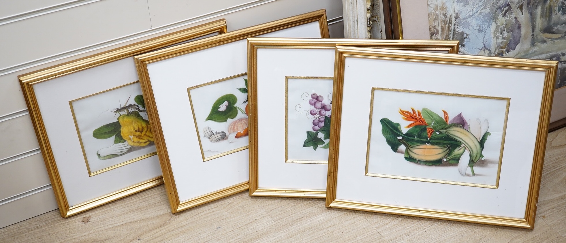 Mid 19th century, Chinese School, set of four pith paintings, Still lifes of fruit and vegetables, 18 x 26cm. Condition - poor, rips to the paper